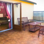 Habitacion doble Atalaia con terraza y sofas casa rural